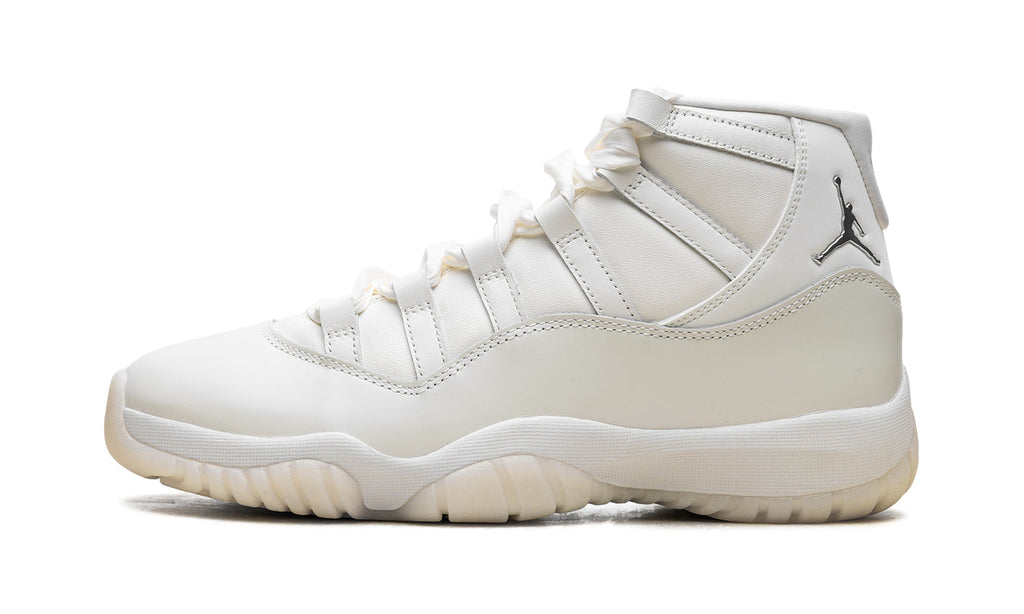 Air Jordan 11 Retro High-Top Sneakers - White and Cream with Metallic Silver Accents