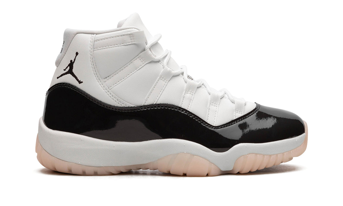 Air Jordan 11 Retro High-Top Sneakers - White and Glossy Black with Pale Peach Outsole