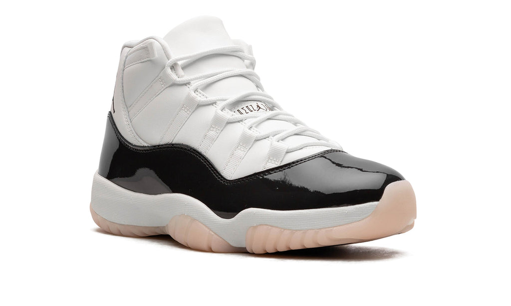 Air Jordan 11 Retro High-Top Sneakers - White and Glossy Black with Pale Peach Outsole