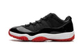 Air Jordan 11 Low Sneakers – Black, Red & White