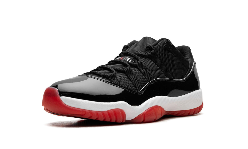Air Jordan 11 Low Sneakers – Black, Red & White