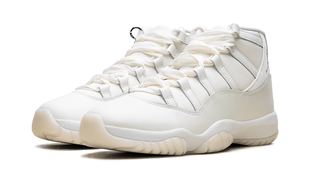 Air Jordan 11 Retro High-Top Sneakers - White and Cream with Metallic Silver Accents