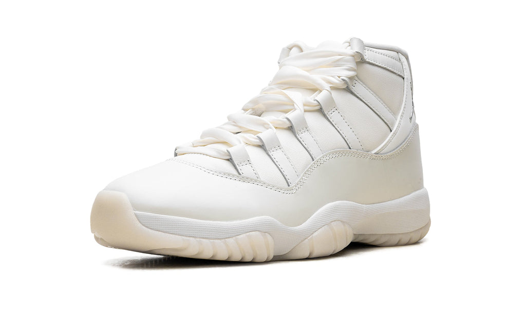 Air Jordan 11 Retro High-Top Sneakers - White and Cream with Metallic Silver Accents