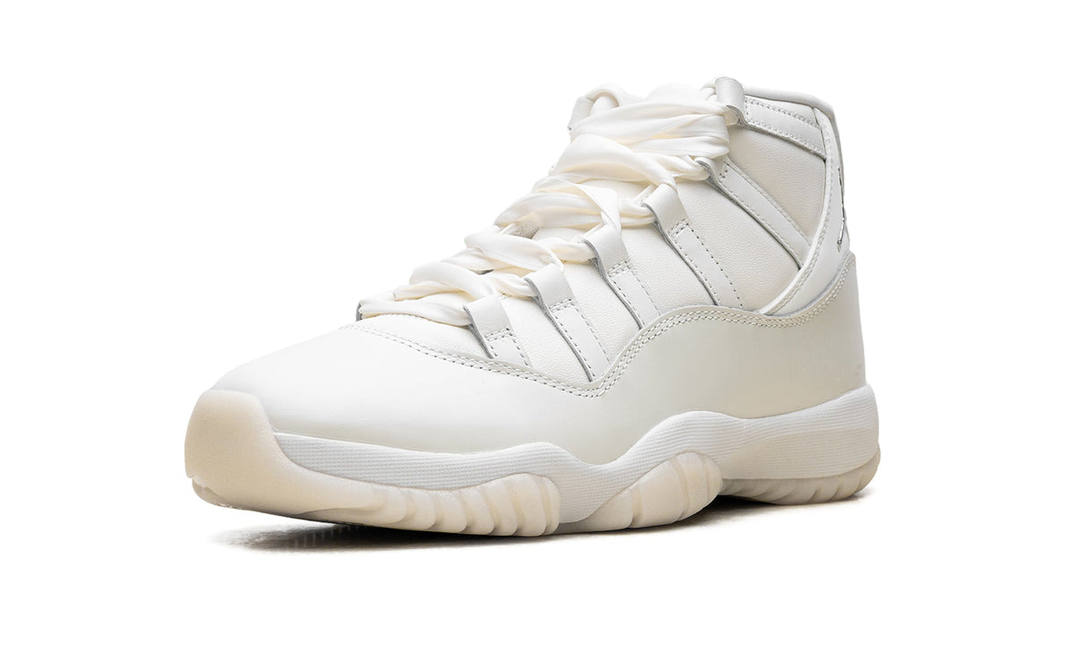 Air Jordan 11 Retro High-Top Sneakers - White and Cream with Metallic Silver Accents
