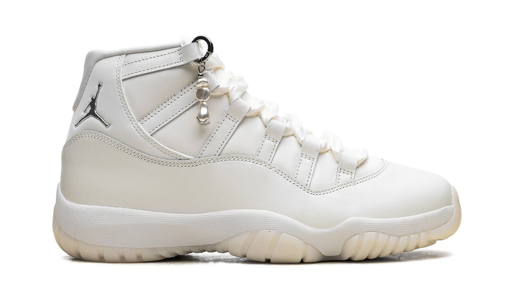 Air Jordan 11 Retro High-Top Sneakers - White and Cream with Metallic Silver Accents