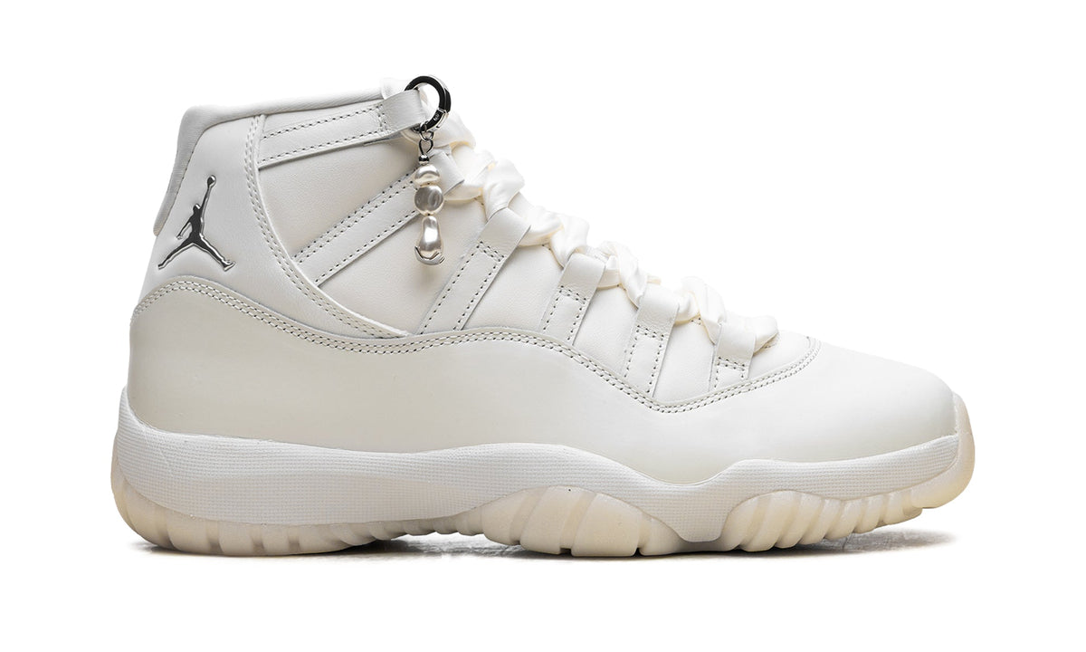 Air Jordan 11 Retro High-Top Sneakers - White and Cream with Metallic Silver Accents